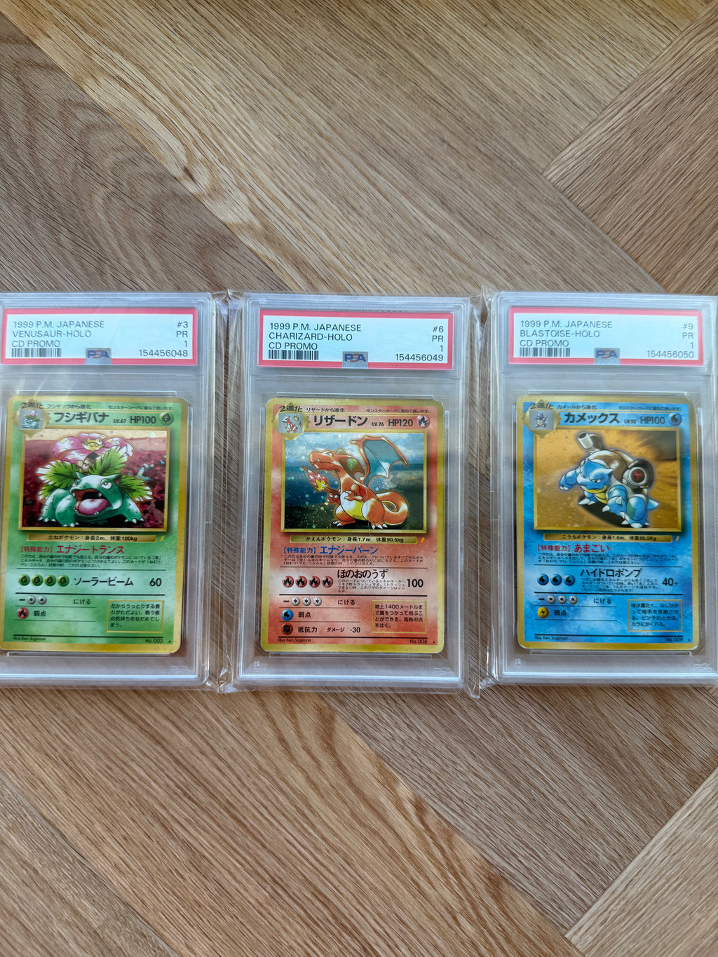 Japansk CD Promo sæt: Venusaur, Charizard & Blastoise - PSA 1