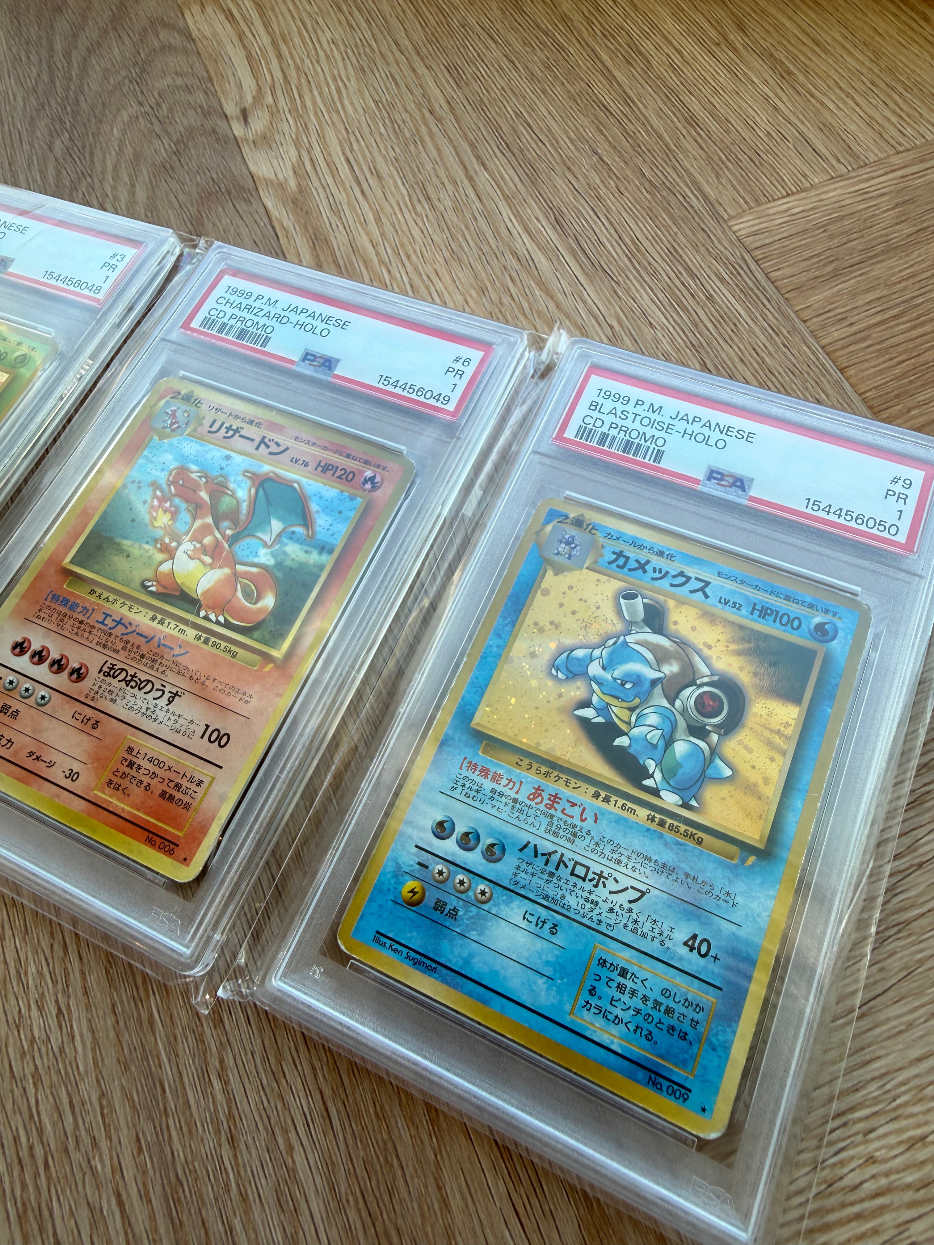 Japansk CD Promo sæt: Venusaur, Charizard & Blastoise - PSA 1