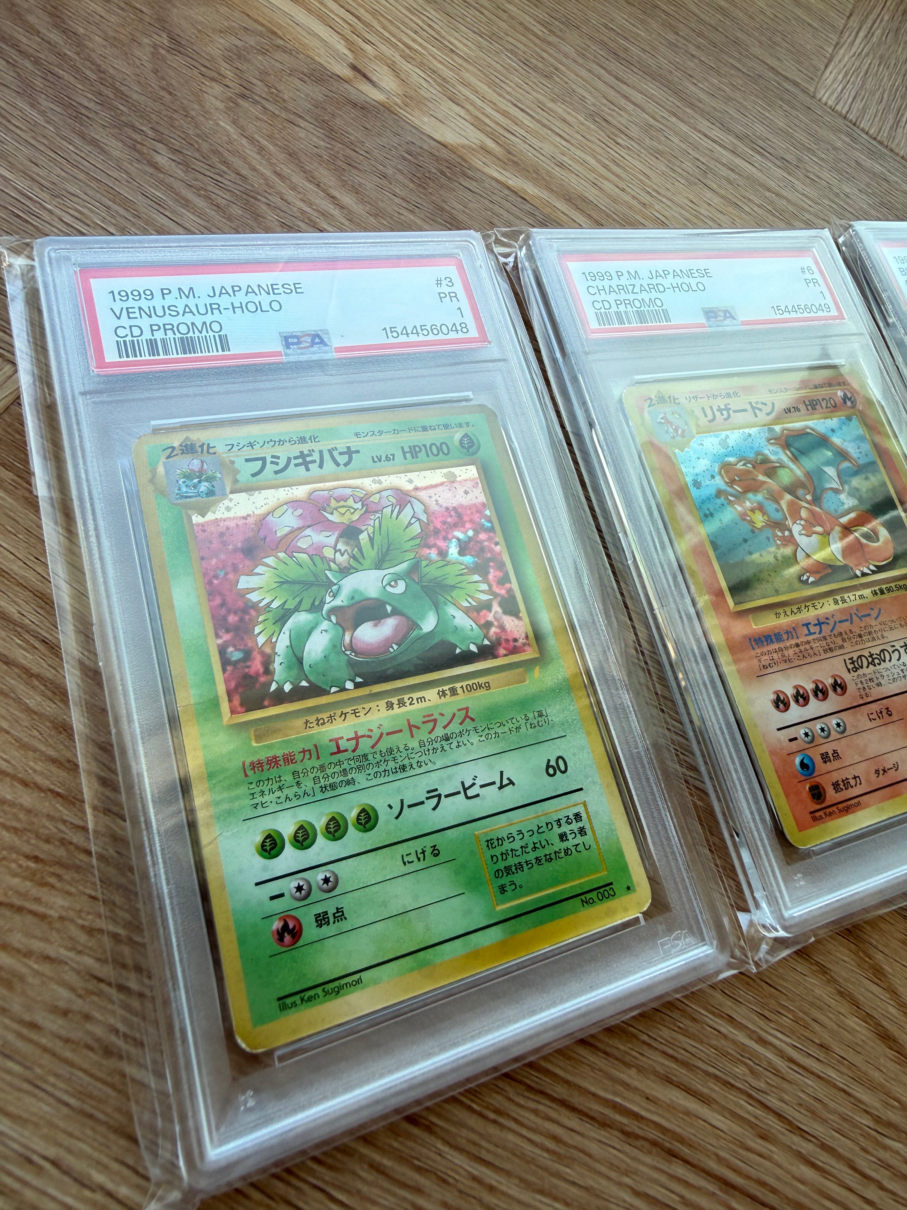 Japansk CD Promo sæt: Venusaur, Charizard & Blastoise - PSA 1